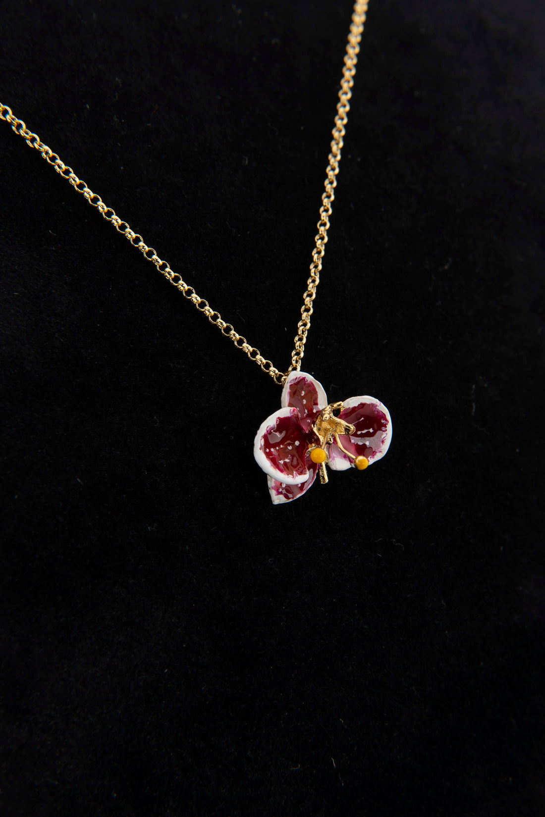 Handcrafted in Tuscany, the Marri Cortona Orchidea Necklace in 18k gold bronze captures the orchid’s grace — elegant, hand-enameled, and timelessly Italian.