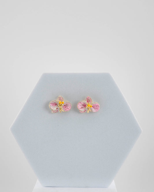 Handcrafted in Tuscany, the Marri Cortona Orchidea Earrings in 18k gold bronze are hand-enameled jewels that blend light, artistry, and timeless elegance.