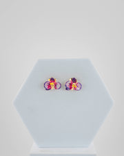Handcrafted in Tuscany, the Marri Cortona Orchidea Earrings in 18k gold bronze are hand-enameled jewels that blend light, artistry, and timeless elegance.