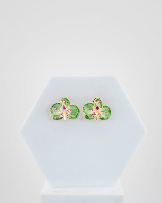 Handcrafted in Tuscany, the Marri Cortona Orchidea Earrings in 18k gold bronze are hand-enameled jewels that blend light, artistry, and timeless elegance.