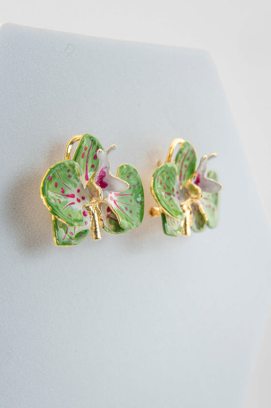 Handcrafted in Tuscany, the Marri Cortona Orchidea Earrings in 18k gold bronze are hand-enameled jewels that blend light, artistry, and timeless elegance.