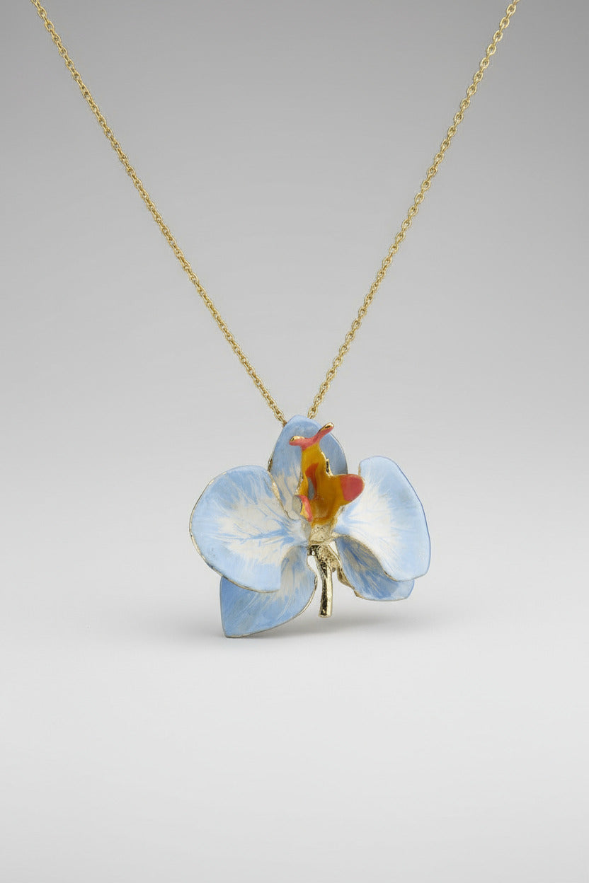 Handcrafted in Tuscany, the Marri Cortona Orchidea Necklace in 18k gold bronze captures the orchid’s grace — elegant, hand-enameled, and timelessly Italian.