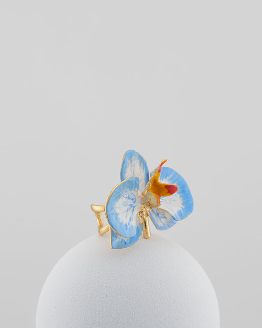 Handcrafted in Tuscany, the Marri Cortona Orchidea Ring in 18k gold bronze captures the orchid’s grace — unique, hand-enameled, and timelessly elegant.