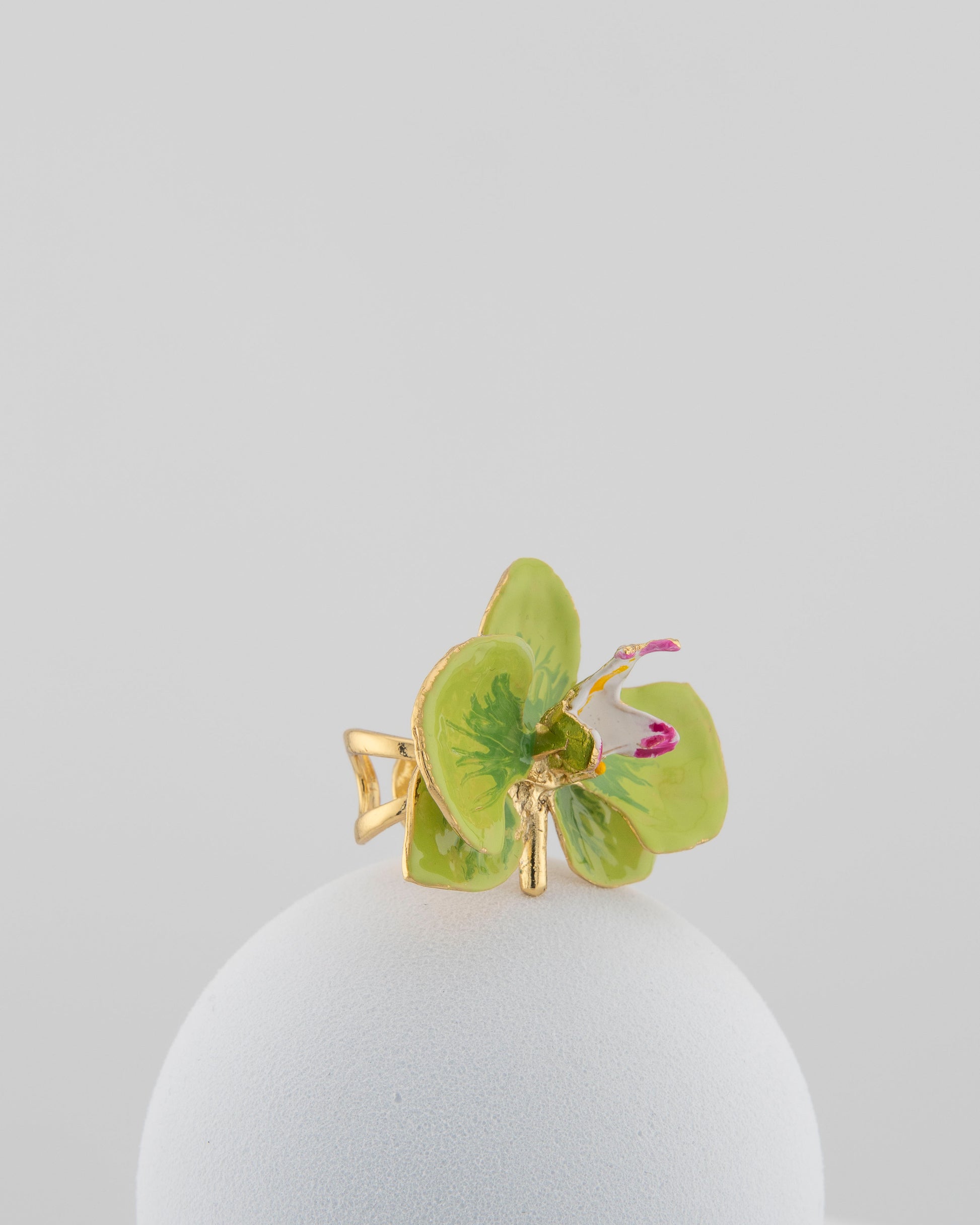 Handcrafted in Tuscany, the Marri Cortona Orchidea Ring in 18k gold bronze captures the orchid’s grace — unique, hand-enameled, and timelessly elegant.