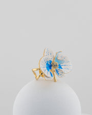 Handcrafted in Tuscany, the Marri Cortona Orchidea Ring in 18k gold bronze captures the orchid’s grace — unique, hand-enameled, and timelessly elegant.