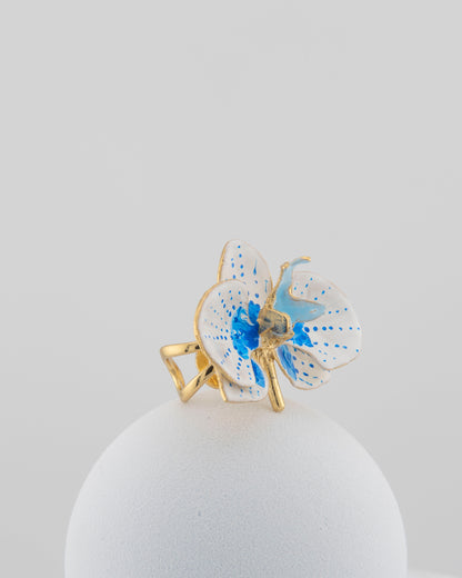 Handcrafted in Tuscany, the Marri Cortona Orchidea Ring in 18k gold bronze captures the orchid’s grace — unique, hand-enameled, and timelessly elegant.