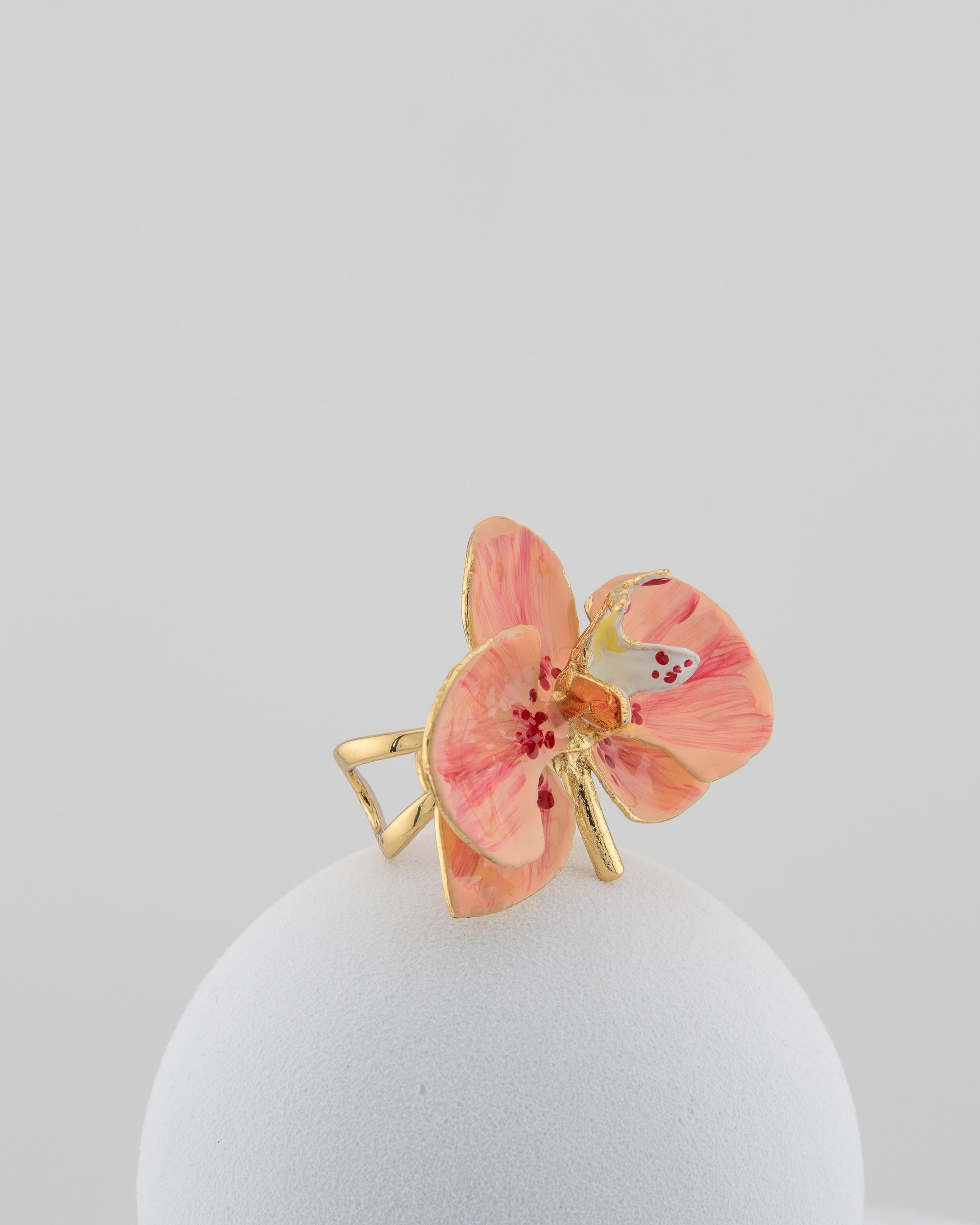 Handcrafted in Tuscany, the Marri Cortona Orchidea Ring in 18k gold bronze captures the orchid’s grace — unique, hand-enameled, and timelessly elegant.