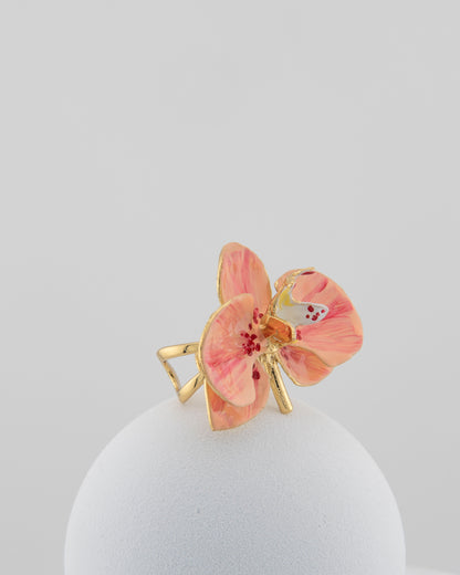 Handcrafted in Tuscany, the Marri Cortona Orchidea Ring in 18k gold bronze captures the orchid’s grace — unique, hand-enameled, and timelessly elegant.