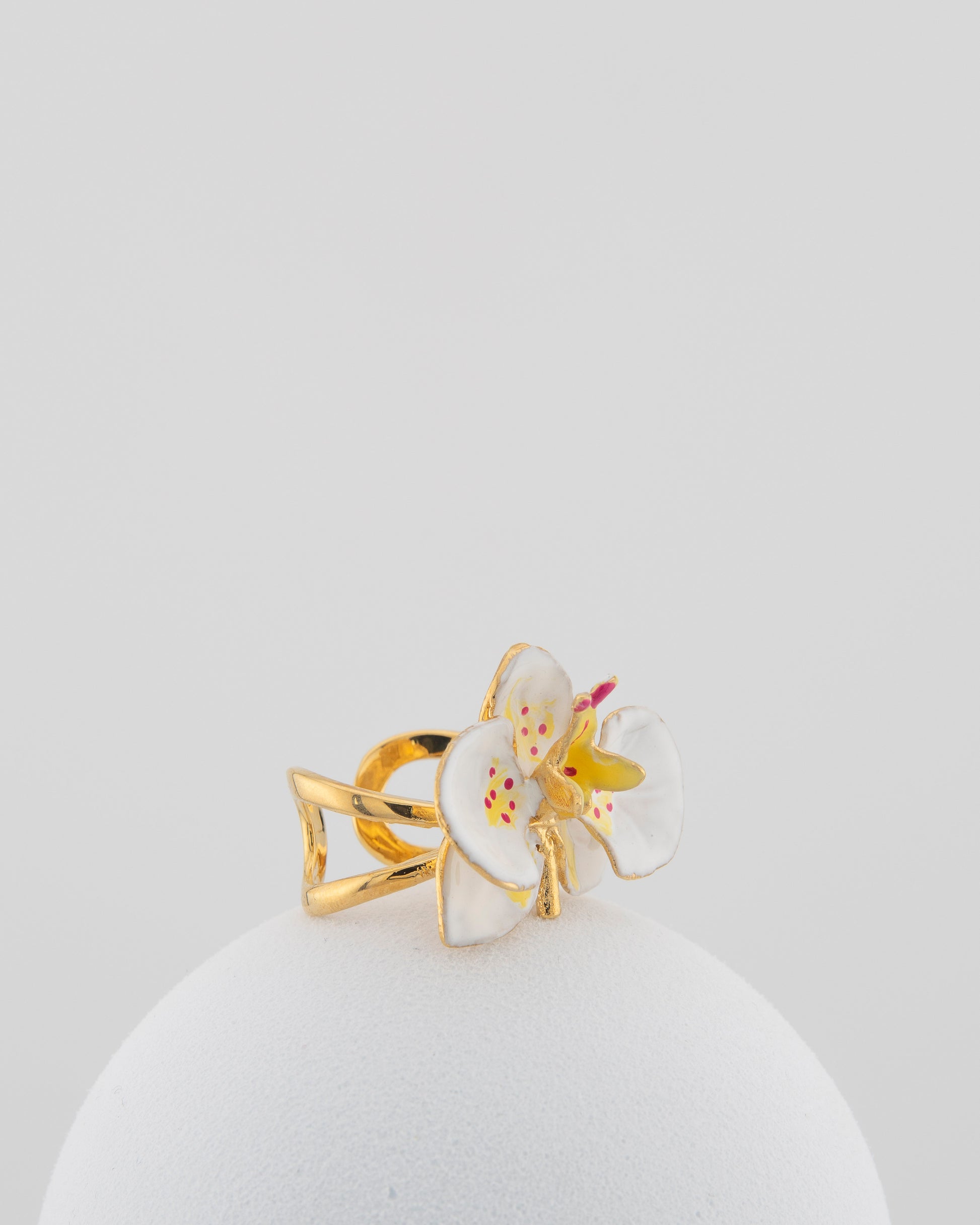 Handcrafted in Tuscany, the Marri Cortona Orchidea Ring in 18k gold bronze captures the orchid’s grace — unique, hand-enameled, and timelessly elegant.