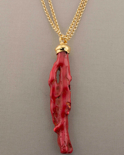 A handcrafted necklace in 18K gold-plated bronze featuring a coral-inspired pendant.
Designed by Marri Cortona and handmade in Tuscany with timeless elegance.