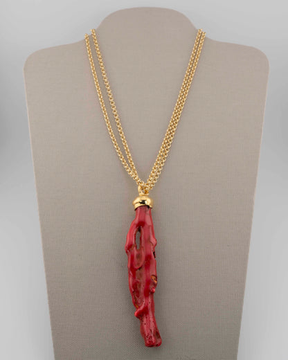 A handcrafted necklace in 18K gold-plated bronze featuring a coral-inspired pendant.
Designed by Marri Cortona and handmade in Tuscany with timeless elegance.