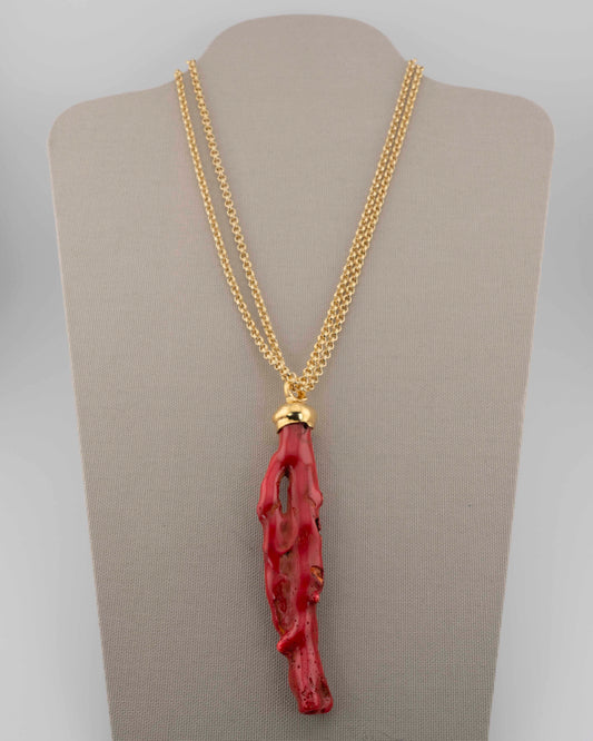 A handcrafted necklace in 18K gold-plated bronze featuring a coral-inspired pendant.
Designed by Marri Cortona and handmade in Tuscany with timeless elegance.