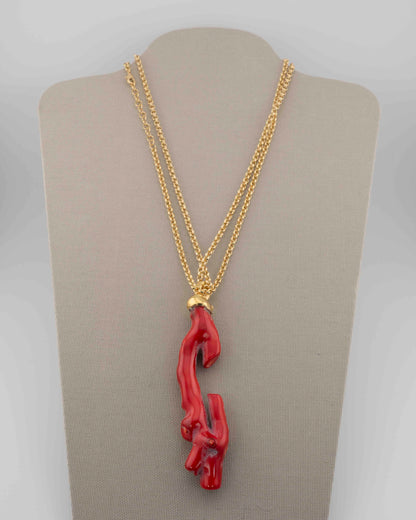 A handcrafted necklace in 18K gold-plated bronze featuring a coral-inspired pendant.
Designed by Marri Cortona and handmade in Tuscany with timeless elegance.