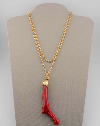 A handcrafted necklace in 18K gold-plated bronze featuring a coral-inspired pendant.
Designed by Marri Cortona and handmade in Tuscany with timeless elegance.