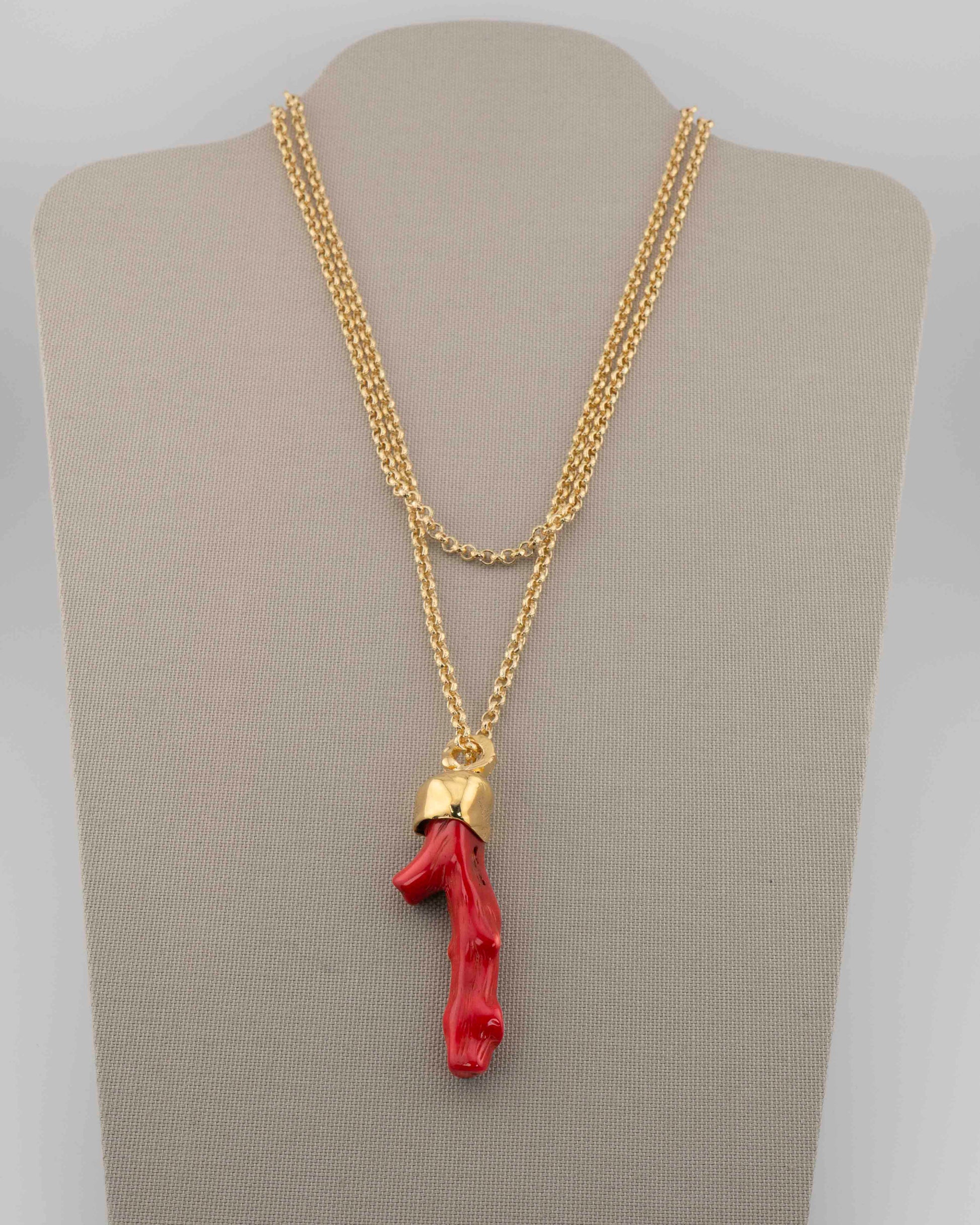 A handcrafted necklace in 18K gold-plated bronze featuring a coral-inspired pendant.
Designed by Marri Cortona and handmade in Tuscany with timeless elegance.
