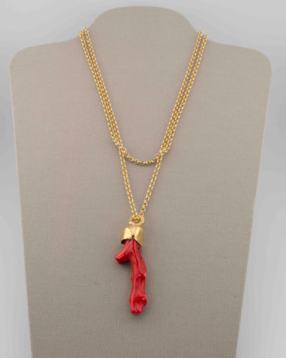 A handcrafted necklace in 18K gold-plated bronze featuring a coral-inspired pendant.
Designed by Marri Cortona and handmade in Tuscany with timeless elegance.