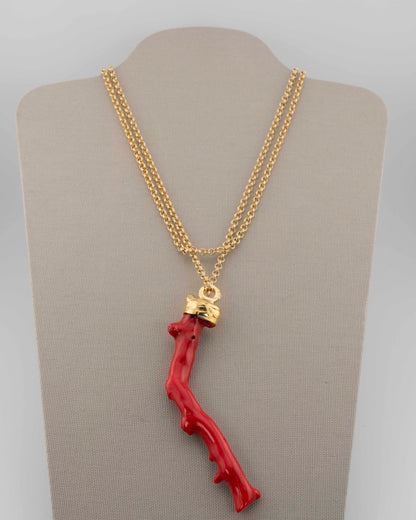 A handcrafted necklace in 18K gold-plated bronze featuring a coral-inspired pendant.
Designed by Marri Cortona and handmade in Tuscany with timeless elegance.