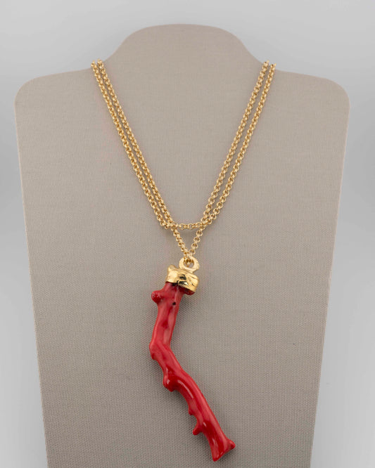 A handcrafted necklace in 18K gold-plated bronze featuring a coral-inspired pendant.
Designed by Marri Cortona and handmade in Tuscany with timeless elegance.