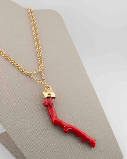 A handcrafted necklace in 18K gold-plated bronze featuring a coral-inspired pendant.
Designed by Marri Cortona and handmade in Tuscany with timeless elegance.