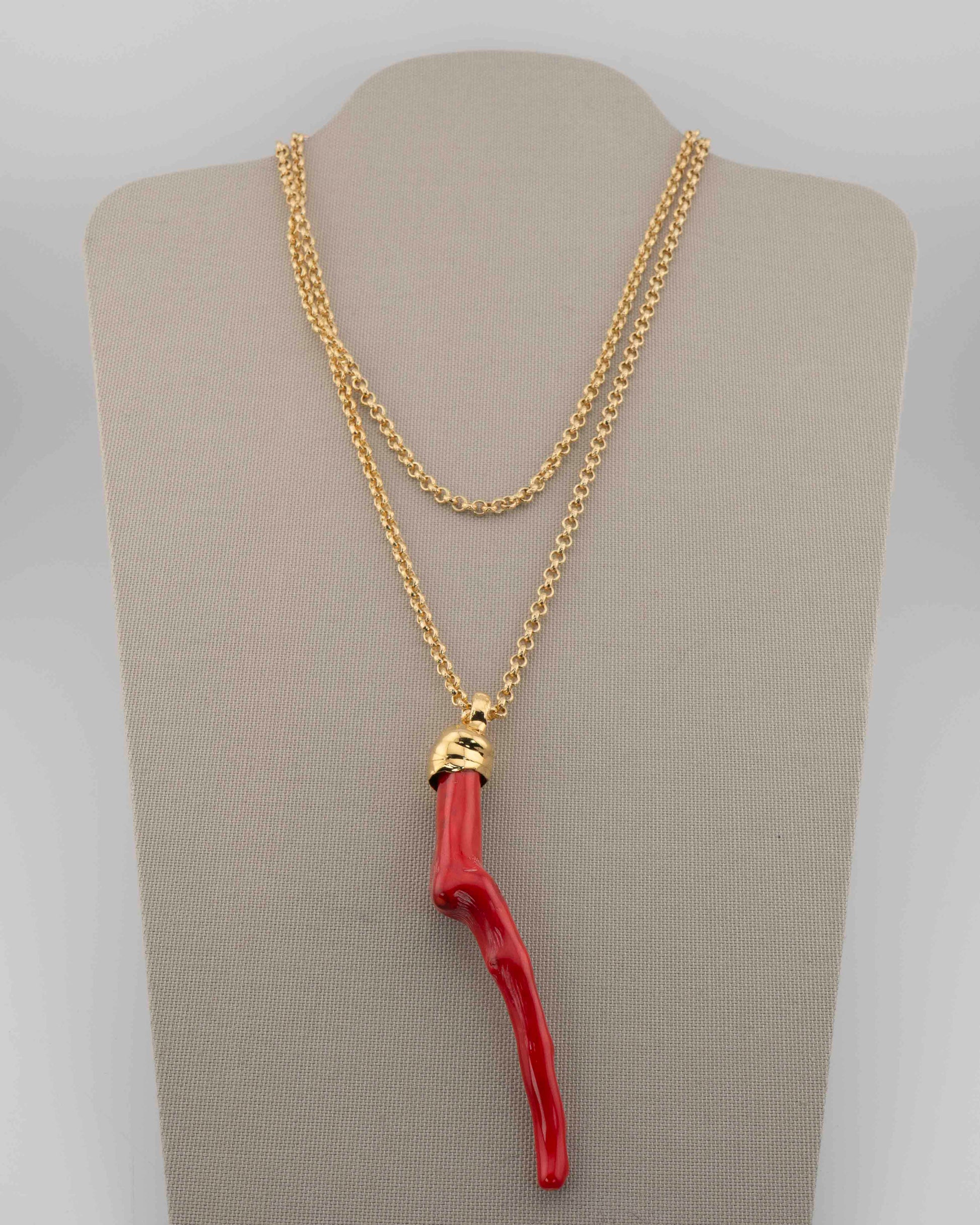 A handcrafted necklace in 18K gold-plated bronze featuring a coral-inspired pendant.
Designed by Marri Cortona and handmade in Tuscany with timeless elegance.