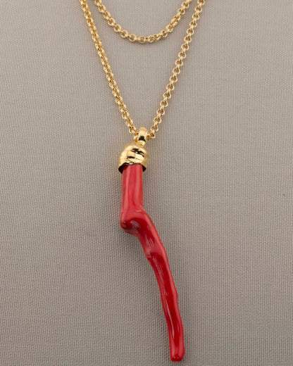 A handcrafted necklace in 18K gold-plated bronze featuring a coral-inspired pendant.
Designed by Marri Cortona and handmade in Tuscany with timeless elegance.