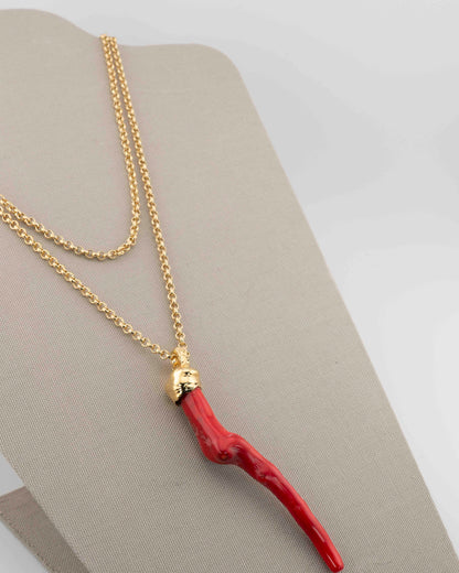 A handcrafted necklace in 18K gold-plated bronze featuring a coral-inspired pendant.
Designed by Marri Cortona and handmade in Tuscany with timeless elegance.