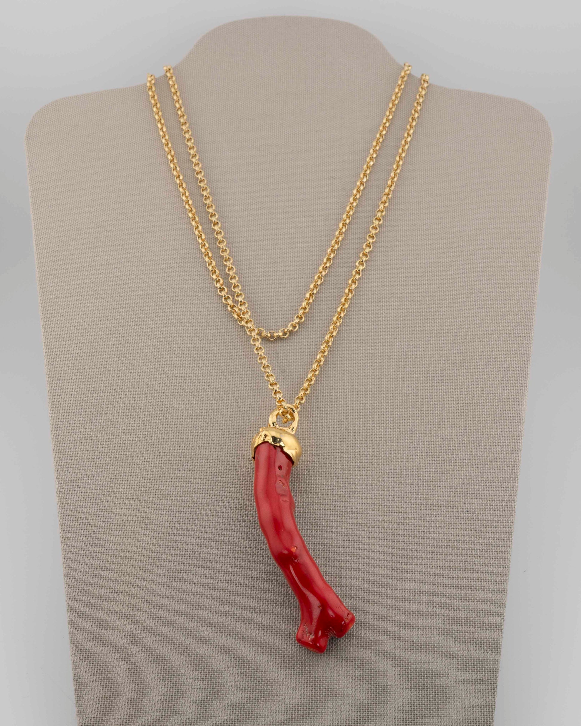 A handcrafted necklace in 18K gold-plated bronze featuring a coral-inspired pendant.
Designed by Marri Cortona and handmade in Tuscany with timeless elegance.