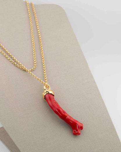 A handcrafted necklace in 18K gold-plated bronze featuring a coral-inspired pendant.
Designed by Marri Cortona and handmade in Tuscany with timeless elegance.
