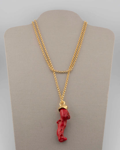 A handcrafted necklace in 18K gold-plated bronze featuring a coral-inspired pendant.
Designed by Marri Cortona and handmade in Tuscany with timeless elegance.