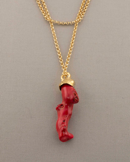 A handcrafted necklace in 18K gold-plated bronze featuring a coral-inspired pendant.
Designed by Marri Cortona and handmade in Tuscany with timeless elegance.