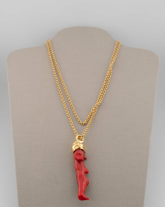 A handcrafted necklace in 18K gold-plated bronze featuring a coral-inspired pendant.
Designed by Marri Cortona and handmade in Tuscany with timeless elegance.