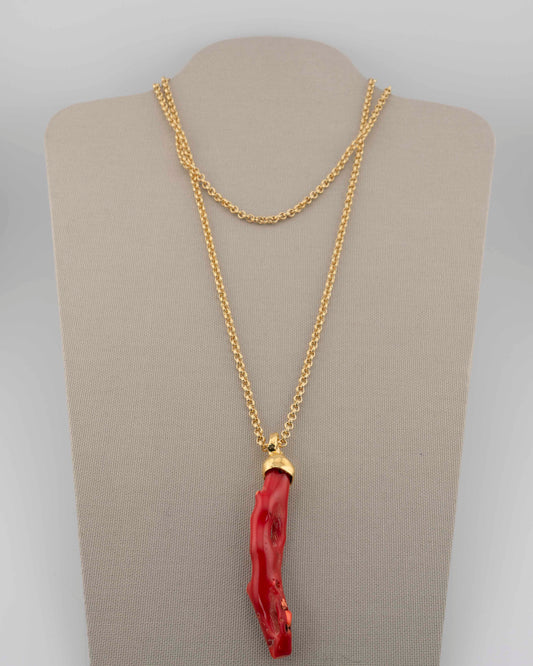 A handcrafted necklace in 18K gold-plated bronze featuring a coral-inspired pendant.
Designed by Marri Cortona and handmade in Tuscany with timeless elegance.