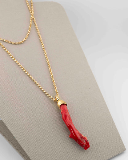 A handcrafted necklace in 18K gold-plated bronze featuring a coral-inspired pendant.
Designed by Marri Cortona and handmade in Tuscany with timeless elegance.