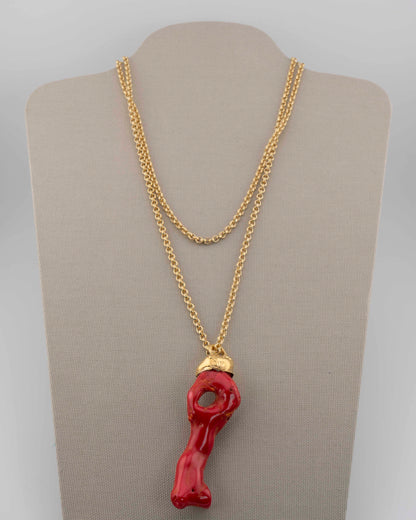 A handcrafted necklace in 18K gold-plated bronze featuring a coral-inspired pendant.
Designed by Marri Cortona and handmade in Tuscany with timeless elegance.