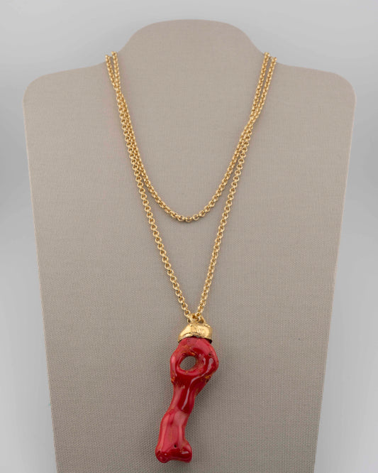 A handcrafted necklace in 18K gold-plated bronze featuring a coral-inspired pendant.
Designed by Marri Cortona and handmade in Tuscany with timeless elegance.