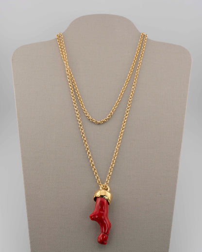 A handcrafted necklace in 18K gold-plated bronze featuring a coral-inspired pendant.
Designed by Marri Cortona and handmade in Tuscany with timeless elegance.