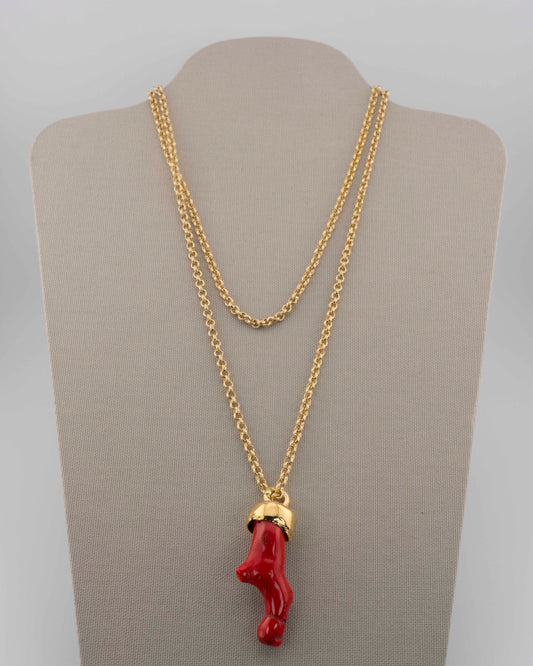 A handcrafted necklace in 18K gold-plated bronze featuring a coral-inspired pendant.
Designed by Marri Cortona and handmade in Tuscany with timeless elegance.