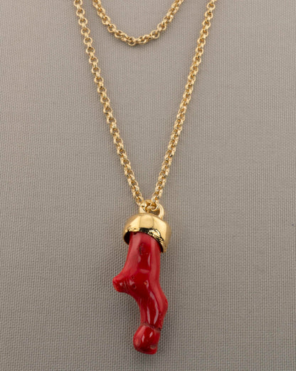 A handcrafted necklace in 18K gold-plated bronze featuring a coral-inspired pendant.
Designed by Marri Cortona and handmade in Tuscany with timeless elegance.