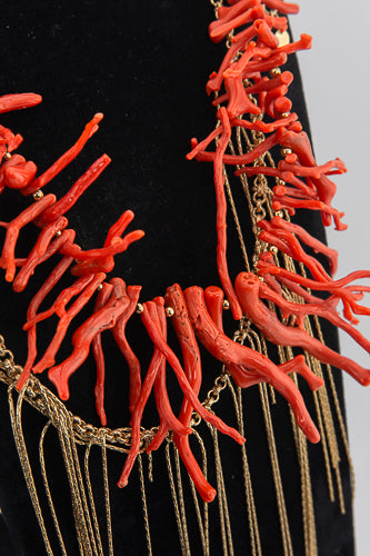 A handcrafted Mediterranean-inspired necklace in 18K gold-plated bronze with coral details. — made by hand in Tuscany.