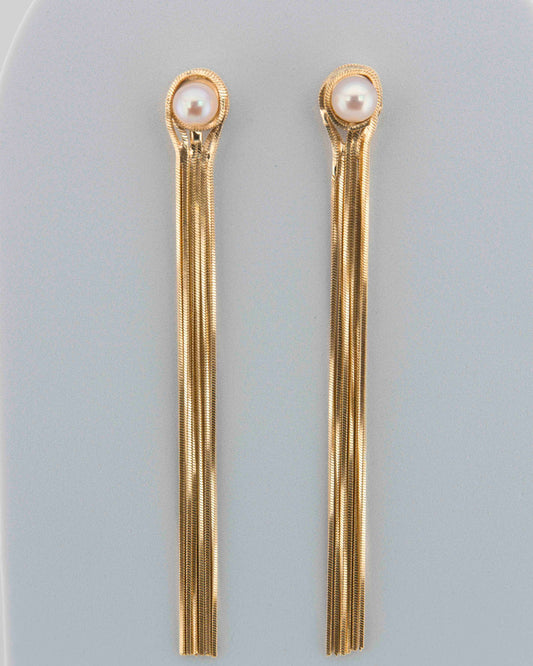 Orecchini fili di luce con perla