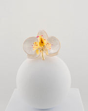 Handcrafted in Tuscany, the Marri Cortona Orchidea Ring in 18k gold bronze captures the orchid’s grace — unique, hand-enameled, and timelessly elegant.