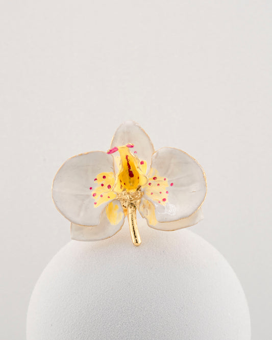 Handcrafted in Tuscany, the Marri Cortona Orchidea Ring in 18k gold bronze captures the orchid’s grace — unique, hand-enameled, and timelessly elegant.