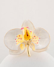 Handcrafted in Tuscany, the Marri Cortona Orchidea Ring in 18k gold bronze captures the orchid’s grace — unique, hand-enameled, and timelessly elegant.
