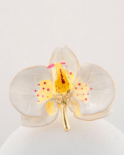 Handcrafted in Tuscany, the Marri Cortona Orchidea Ring in 18k gold bronze captures the orchid’s grace — unique, hand-enameled, and timelessly elegant.