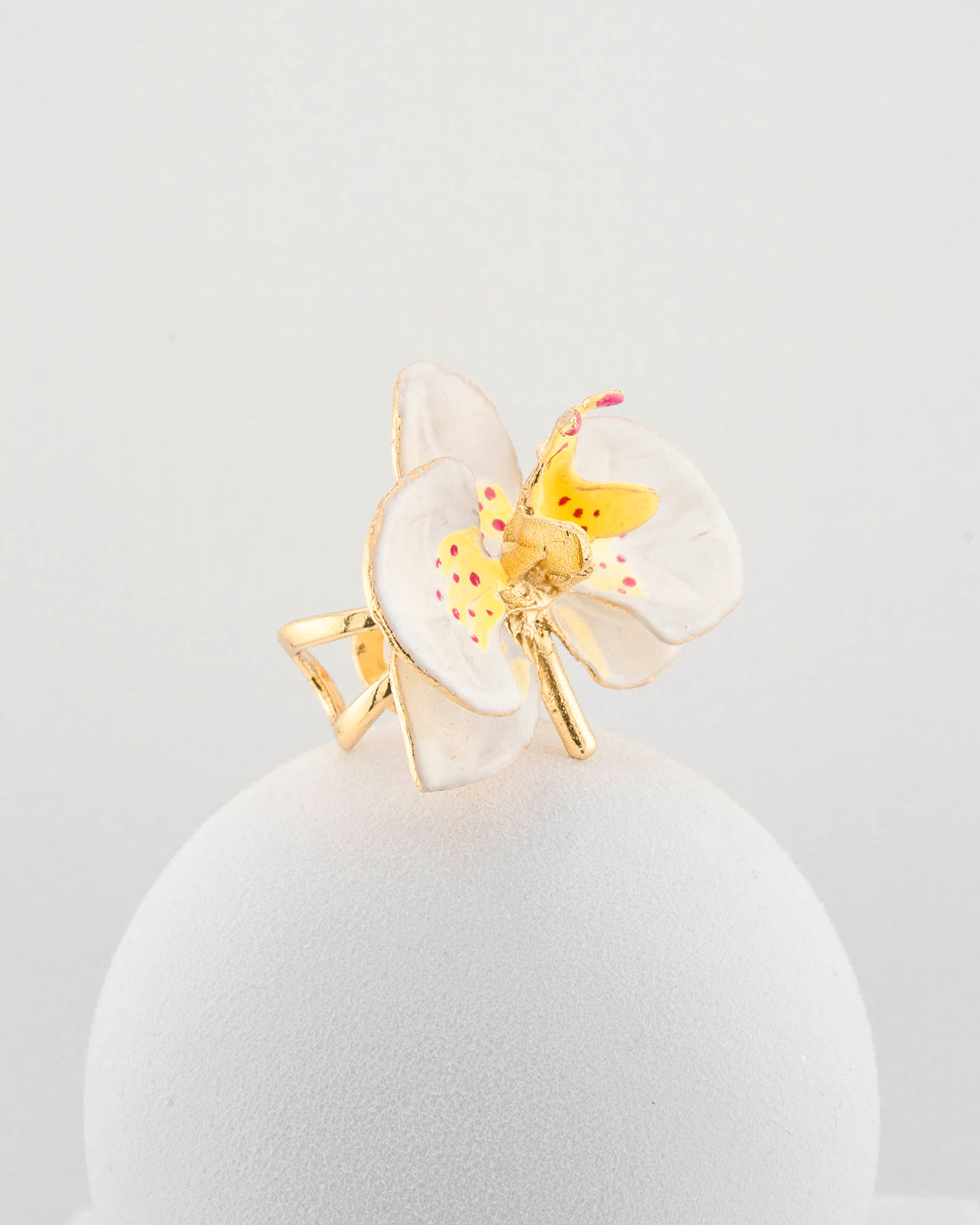 Handcrafted in Tuscany, the Marri Cortona Orchidea Ring in 18k gold bronze captures the orchid’s grace — unique, hand-enameled, and timelessly elegant.