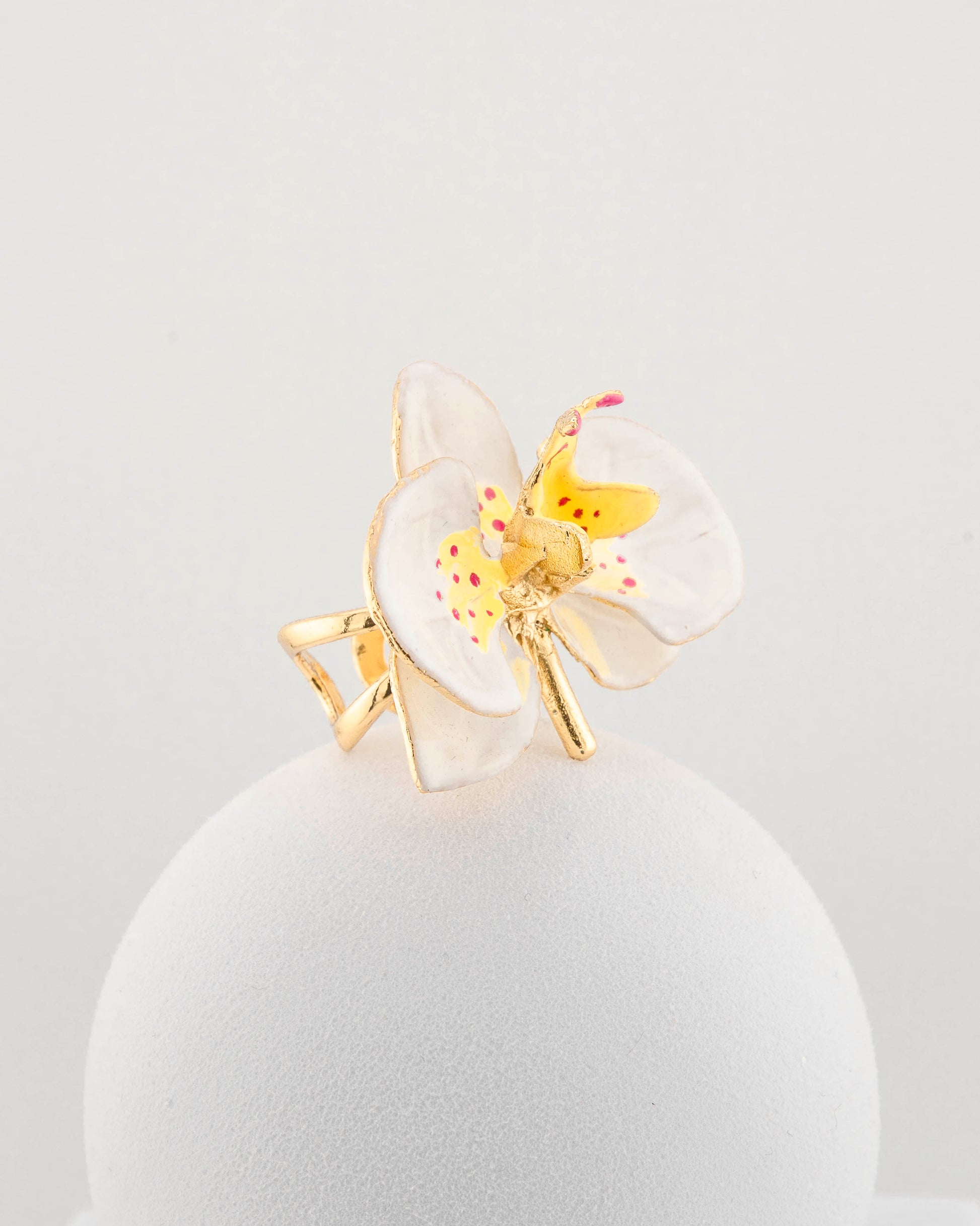 Handcrafted in Tuscany, the Marri Cortona Orchidea Ring in 18k gold bronze captures the orchid’s grace — unique, hand-enameled, and timelessly elegant.