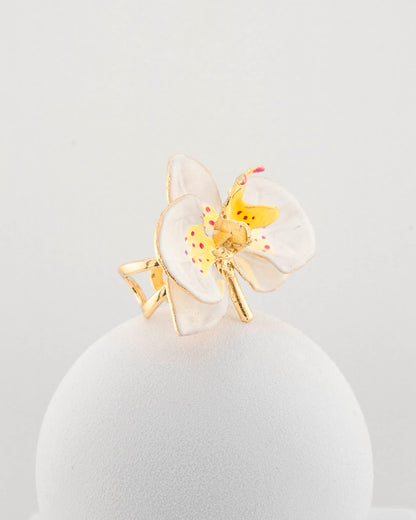 Handcrafted in Tuscany, the Marri Cortona Orchidea Ring in 18k gold bronze captures the orchid’s grace — unique, hand-enameled, and timelessly elegant.