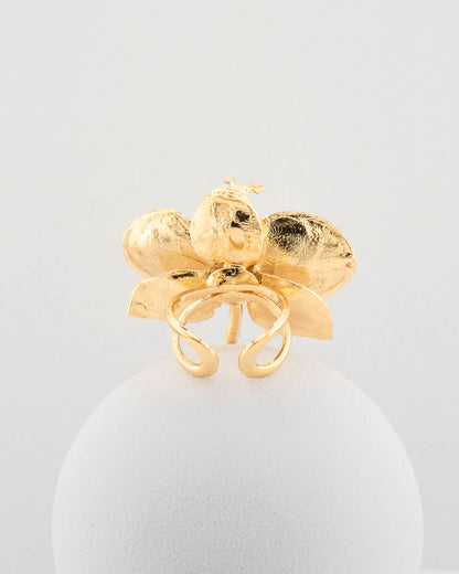 Handcrafted in Tuscany, the Marri Cortona Orchidea Ring in 18k gold bronze captures the orchid’s grace — unique, hand-enameled, and timelessly elegant.