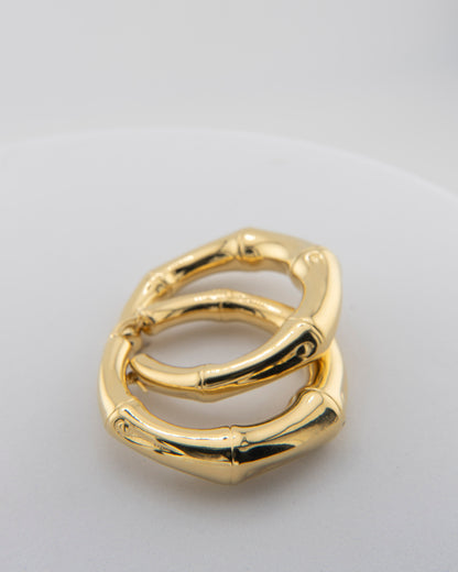 The Doré Collection by Marri Cortona, handmade in Tuscany, celebrates light through elegant 18k gold earrings blending geometry, harmony, and craftsmanship.