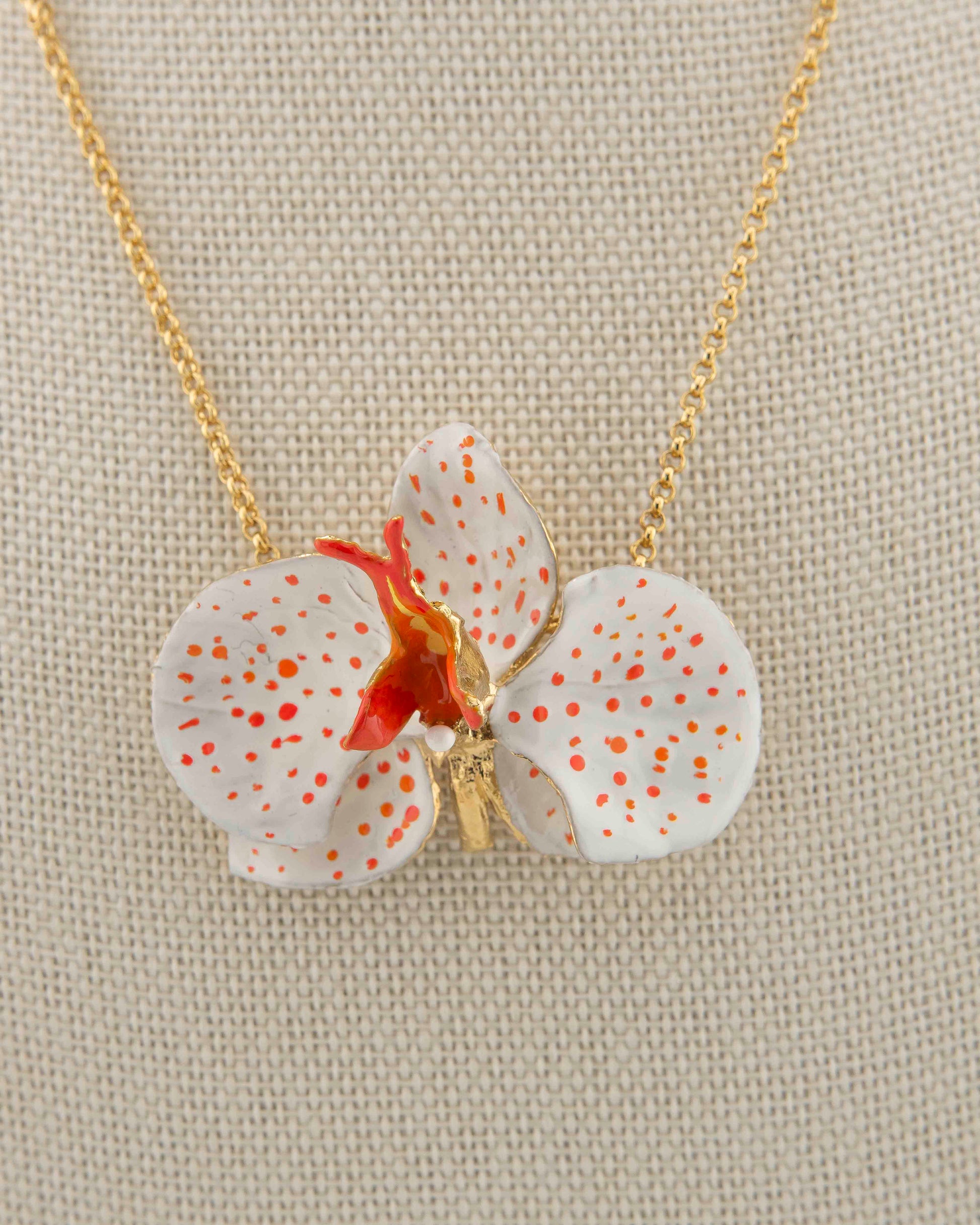 Handcrafted in Tuscany, the Marri Cortona Orchidea Necklace in 18k gold bronze captures the orchid’s grace — elegant, hand-enameled, and timelessly Italian.